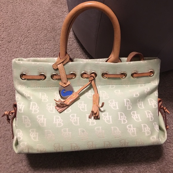 Dooney & Bourke Handbags - Dooney & Bourke Tassel Tote great Vintage
